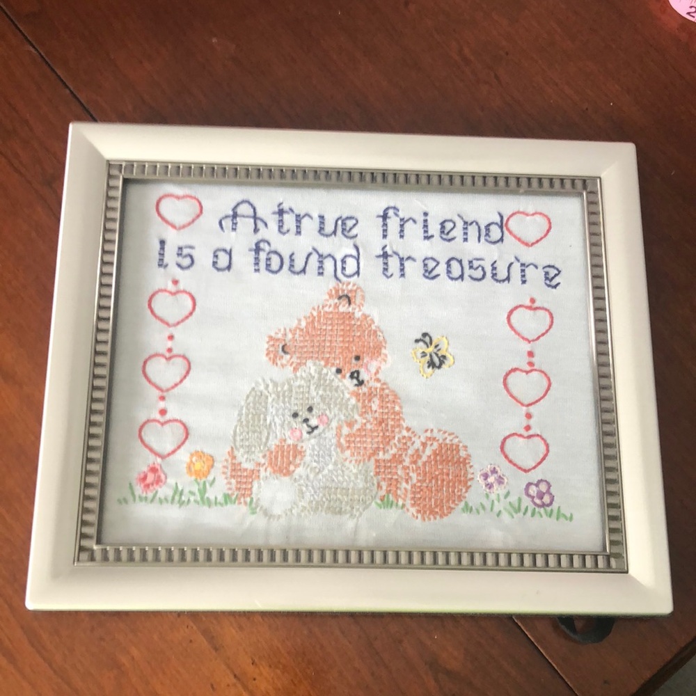 Cross stitch of a teddy bear and bunny “A true friend is a found treasure “